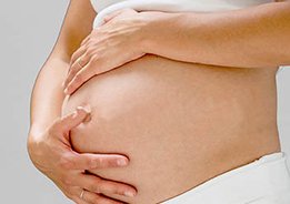 Pregnant woman indoors